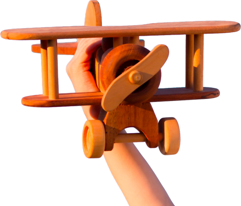 child-pilot-playing-with-wooden-airplane-toy-outdo-2026-09-22-17-25-55-utc-CUT